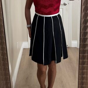 INC skirt; black with white trims
